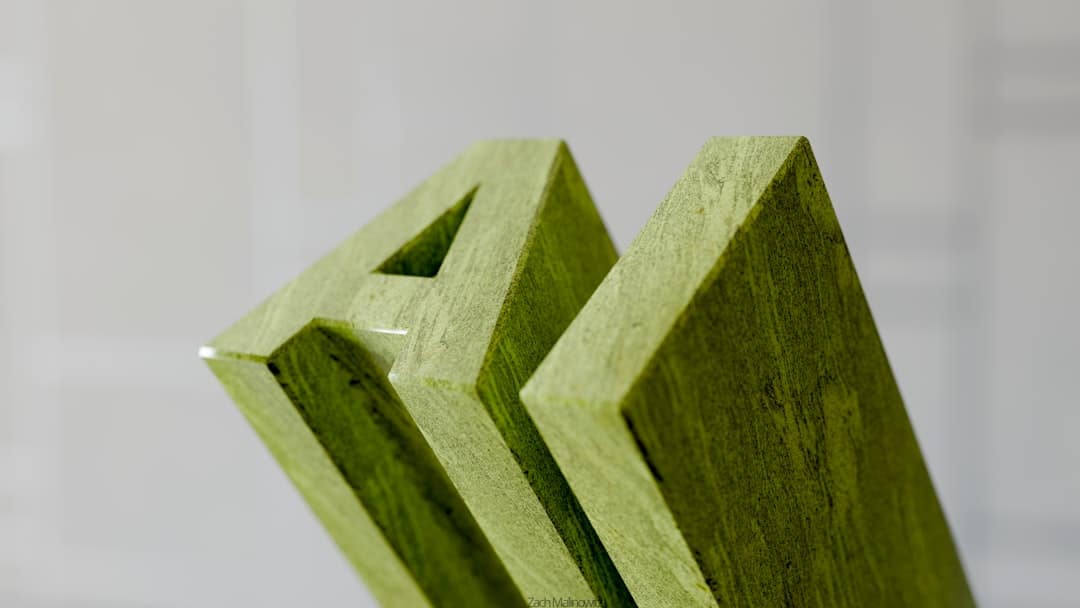 Green wooden letters spelling out 