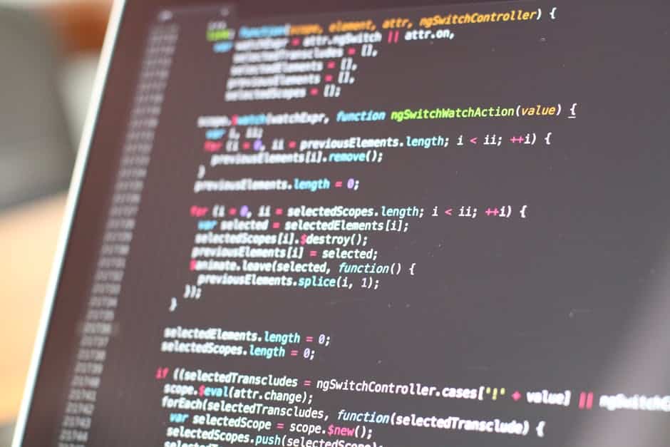 API design best practices - Close-up view of colorful code on a laptop screen, showcasing programming concepts.