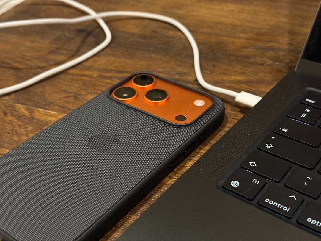 MCP - Smartphone connected to a laptop with a cable