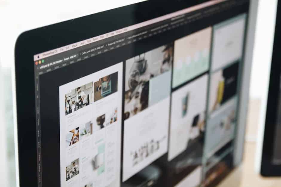 WCAG compliance - A modern computer screen displaying web design work, showcasing creative visuals in a workspace.