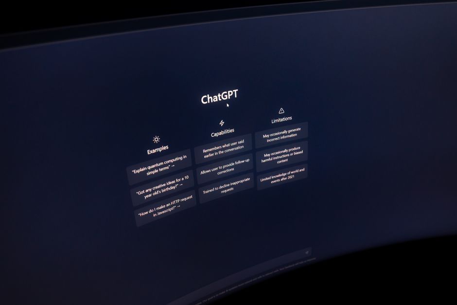 consumer tech - Close-up of a computer screen displaying ChatGPT interface in a dark setting.